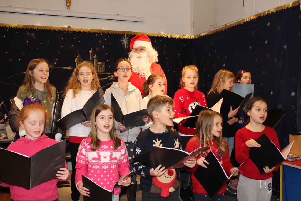 Image of School Choir singing Carols at Wadhurst Manor